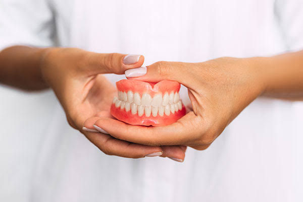 Understanding the Benefits and Care of Full Dentures